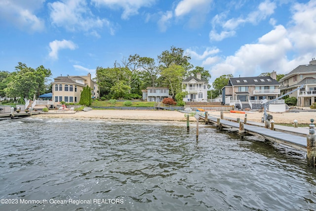 dock area featuring a water view