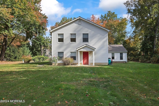 view of front of home with a front yard