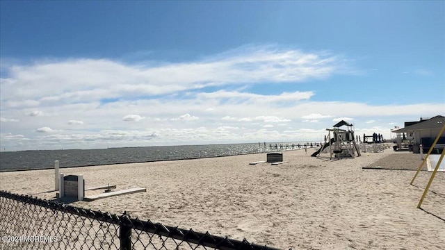 view of water feature with a beach view