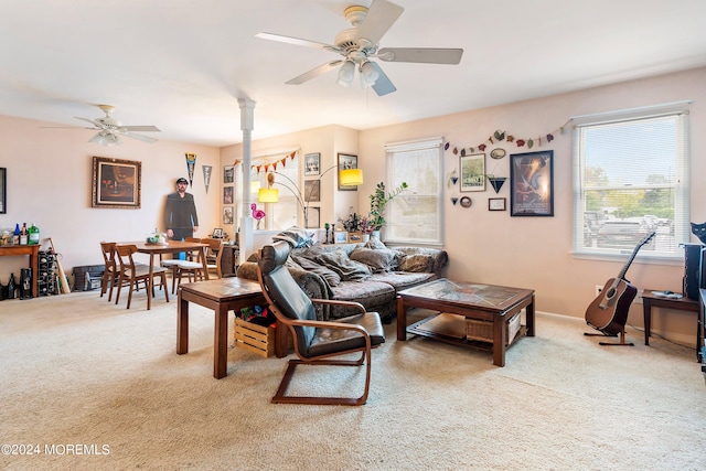 living room with ceiling fan and light carpet