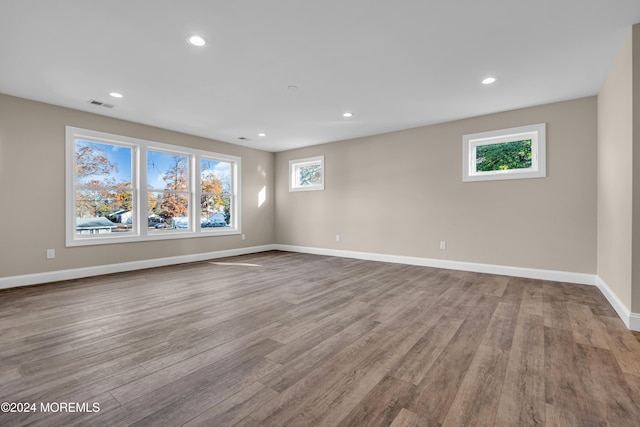 empty room with light hardwood / wood-style floors