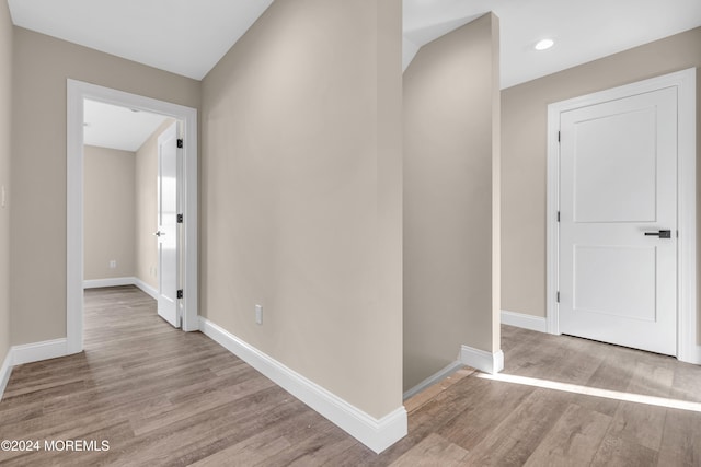 hallway featuring light wood-type flooring