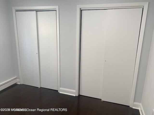 closet with a baseboard heating unit