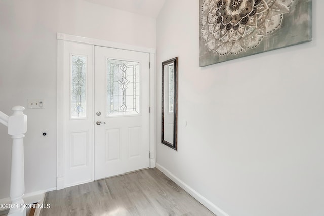 foyer with light hardwood / wood-style flooring