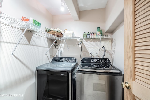 laundry area with washer and dryer