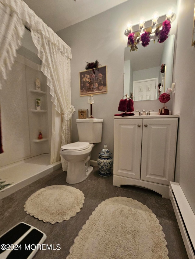 bathroom featuring vanity, a baseboard heating unit, a shower with shower curtain, and toilet