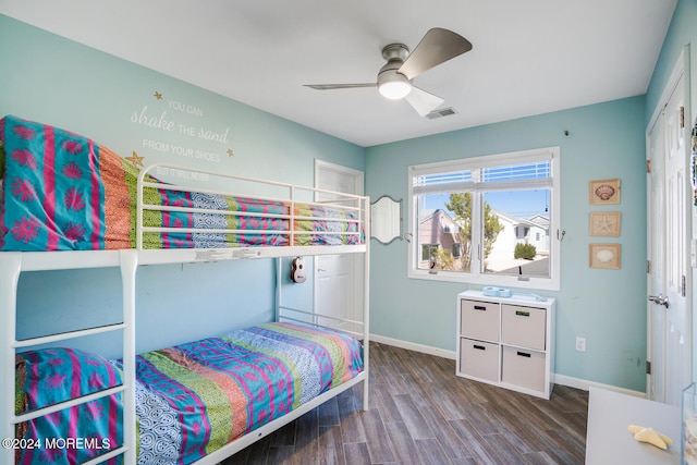 bedroom with a closet, ceiling fan, and wood-type flooring