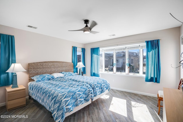 bedroom with ceiling fan and hardwood / wood-style floors