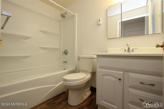 full bathroom with toilet, shower / tub combination, vanity, and wood-type flooring