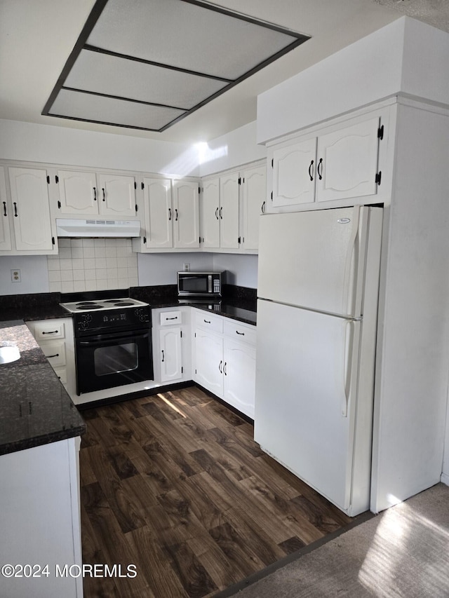 kitchen featuring black / electric stove, white fridge, white cabinetry, and dark hardwood / wood-style flooring