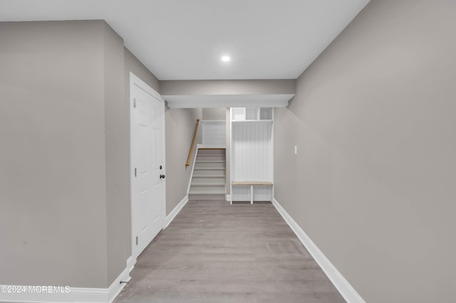 hallway with light wood-type flooring