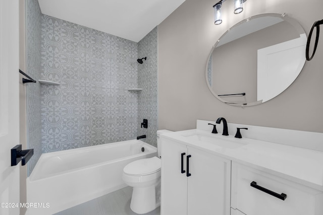 full bathroom with vanity, toilet, and tiled shower / bath