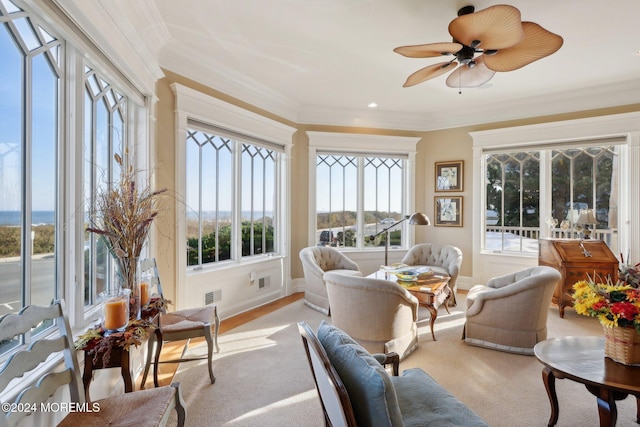 sunroom / solarium with ceiling fan