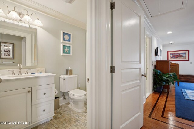 1805 Ocean Ave, Spring Lake, NJ 07762 - half bathroom with crown molding, toilet, vanity, and recessed lighting