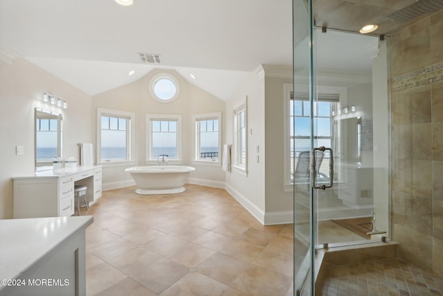 bathroom featuring vanity, ornamental molding, independent shower and bath, and tile patterned flooring