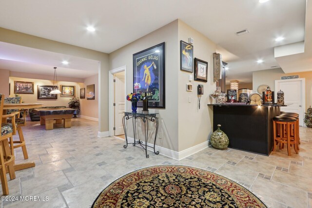 1805 Ocean Ave, Spring Lake, NJ 07762 - entryway featuring pool table, stone finish flooring, baseboards, recessed lighting, and a bar
