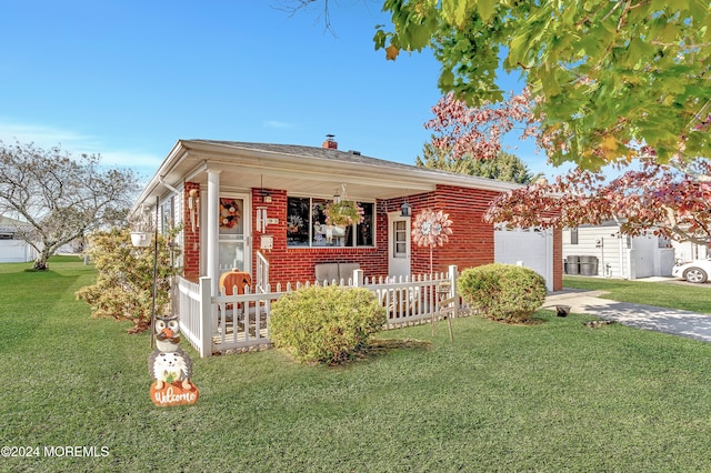 view of front facade with a garage and a front lawn