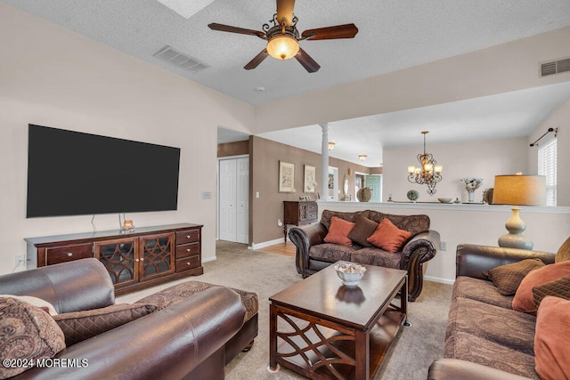 living room with light carpet, a textured ceiling, and ceiling fan with notable chandelier