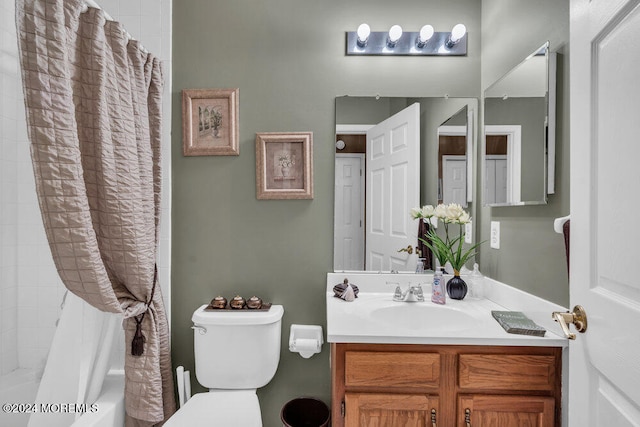 full bathroom with vanity, toilet, and shower / bathtub combination with curtain