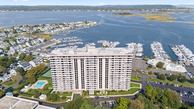 drone / aerial view with a water view