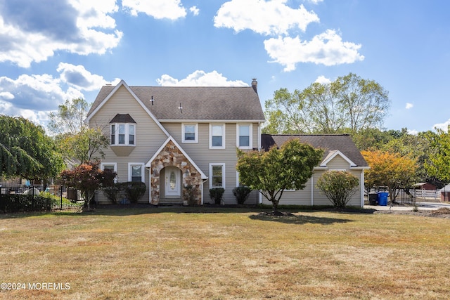 view of front of home with a front lawn