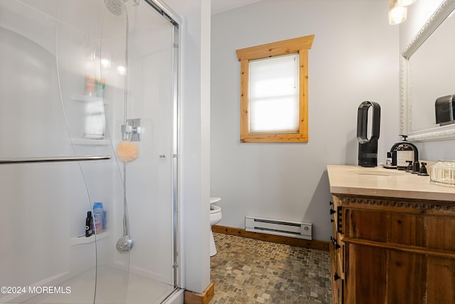 bathroom with toilet, an enclosed shower, vanity, and a baseboard radiator