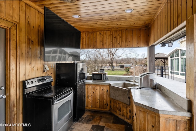 view of patio / terrace featuring sink and exterior kitchen