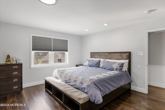 bedroom featuring dark hardwood / wood-style floors