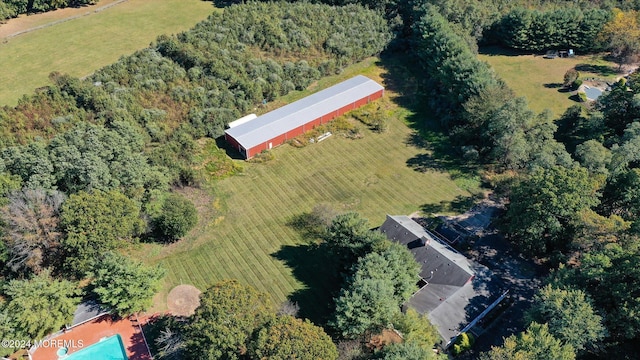 birds eye view of property with a rural view