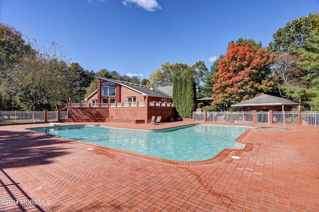 view of pool with a patio area