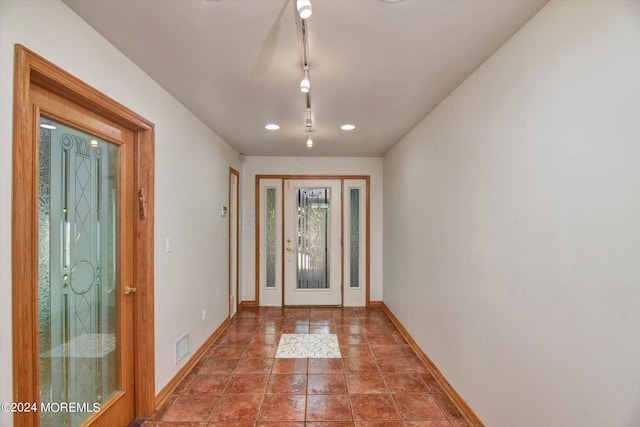 entryway with tile patterned flooring