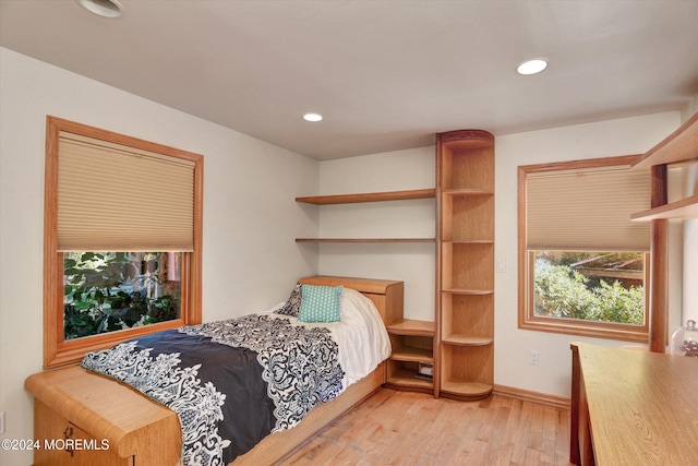 bedroom featuring light wood-type flooring