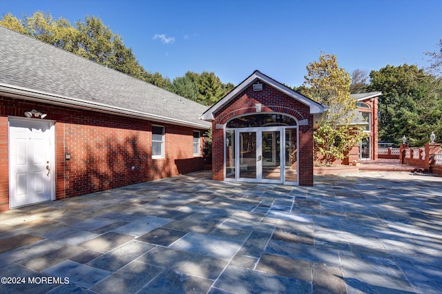 exterior space featuring a patio and french doors