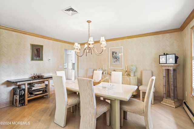 dining area with light hardwood / wood-style flooring, crown molding, a baseboard heating unit, and an inviting chandelier