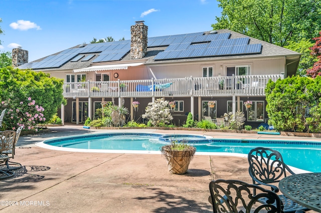 view of pool featuring a patio area