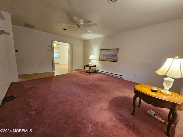 sitting room featuring a baseboard heating unit, carpet floors, and ceiling fan