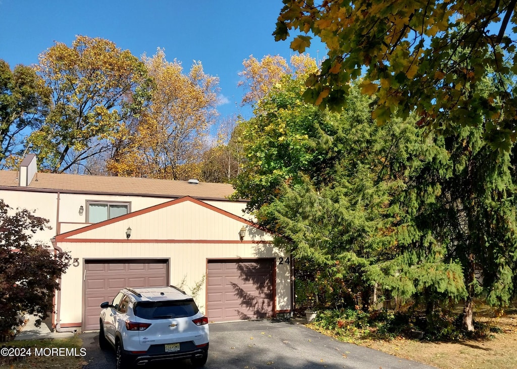 exterior space featuring a garage