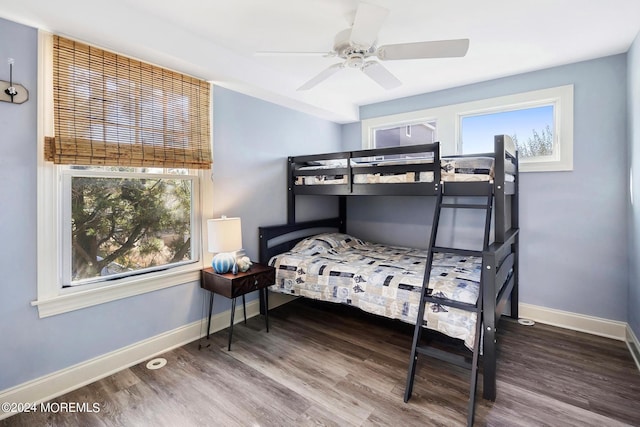 bedroom featuring ceiling fan and wood-type flooring