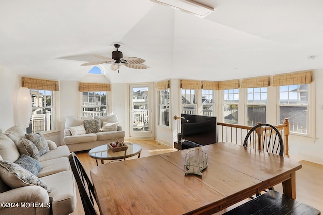 sunroom / solarium featuring ceiling fan and vaulted ceiling