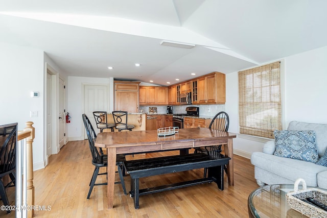 dining area with light wood-type flooring