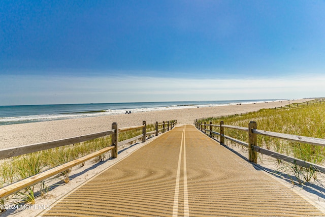 view of water feature featuring a beach view