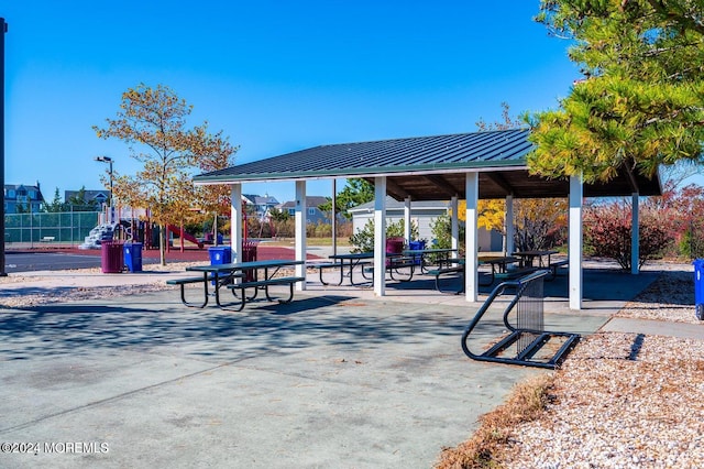 view of property's community with a gazebo and a playground