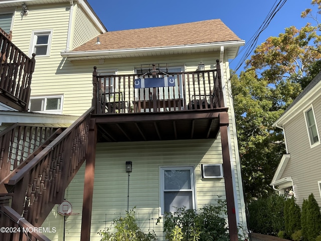 508 7th Ave Unit 2, Asbury Park, NJ 07712 - back of property featuring stairway and a shingled roof