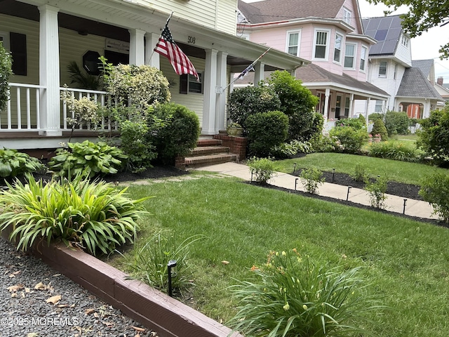 508 7th Ave Unit 2, Asbury Park, NJ 07712 - view of grassy yard featuring covered porch