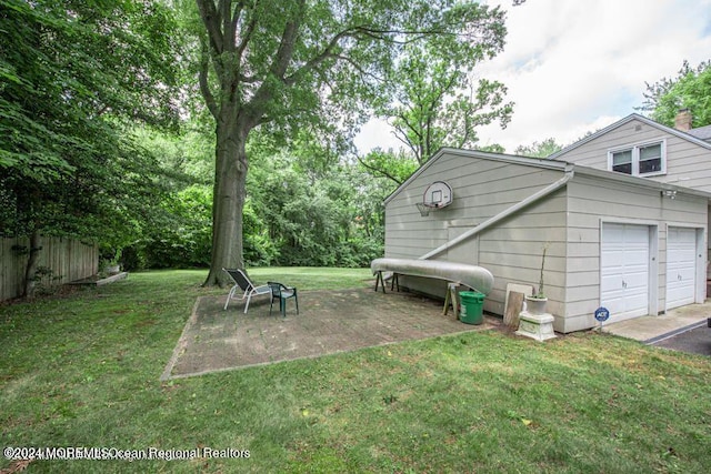 view of yard featuring a garage