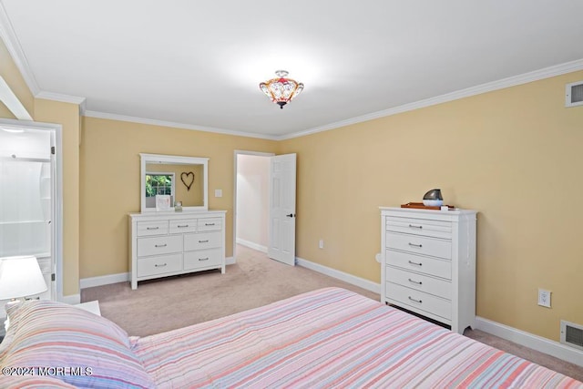 bedroom with ensuite bathroom, ornamental molding, and light colored carpet