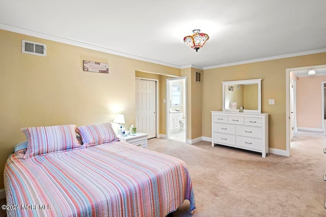 bedroom featuring connected bathroom, light carpet, and ornamental molding