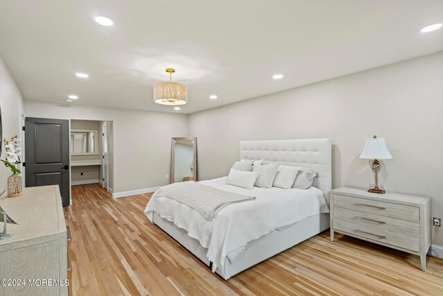 bedroom featuring hardwood / wood-style floors