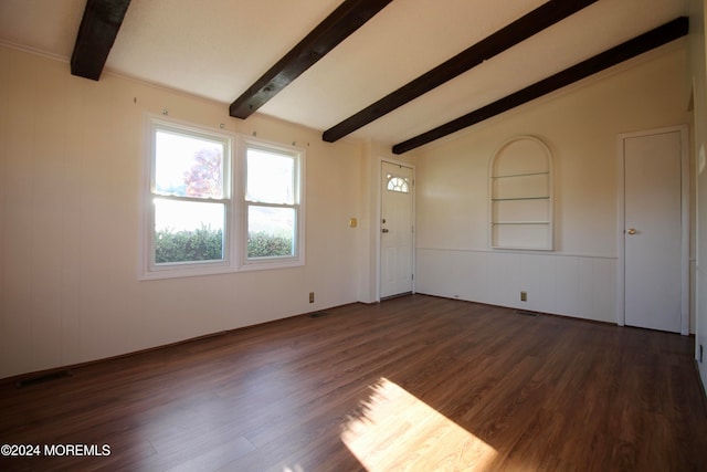 unfurnished room featuring vaulted ceiling with beams and dark hardwood / wood-style flooring