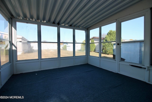 unfurnished sunroom with a healthy amount of sunlight